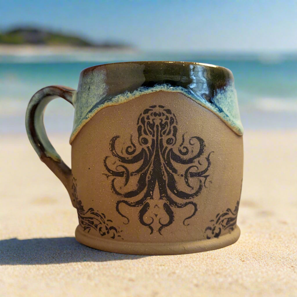 Ceramic mug with an octopus design on a gradient background