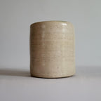 Tea Cup, Buddha face, serene happy face carved design.