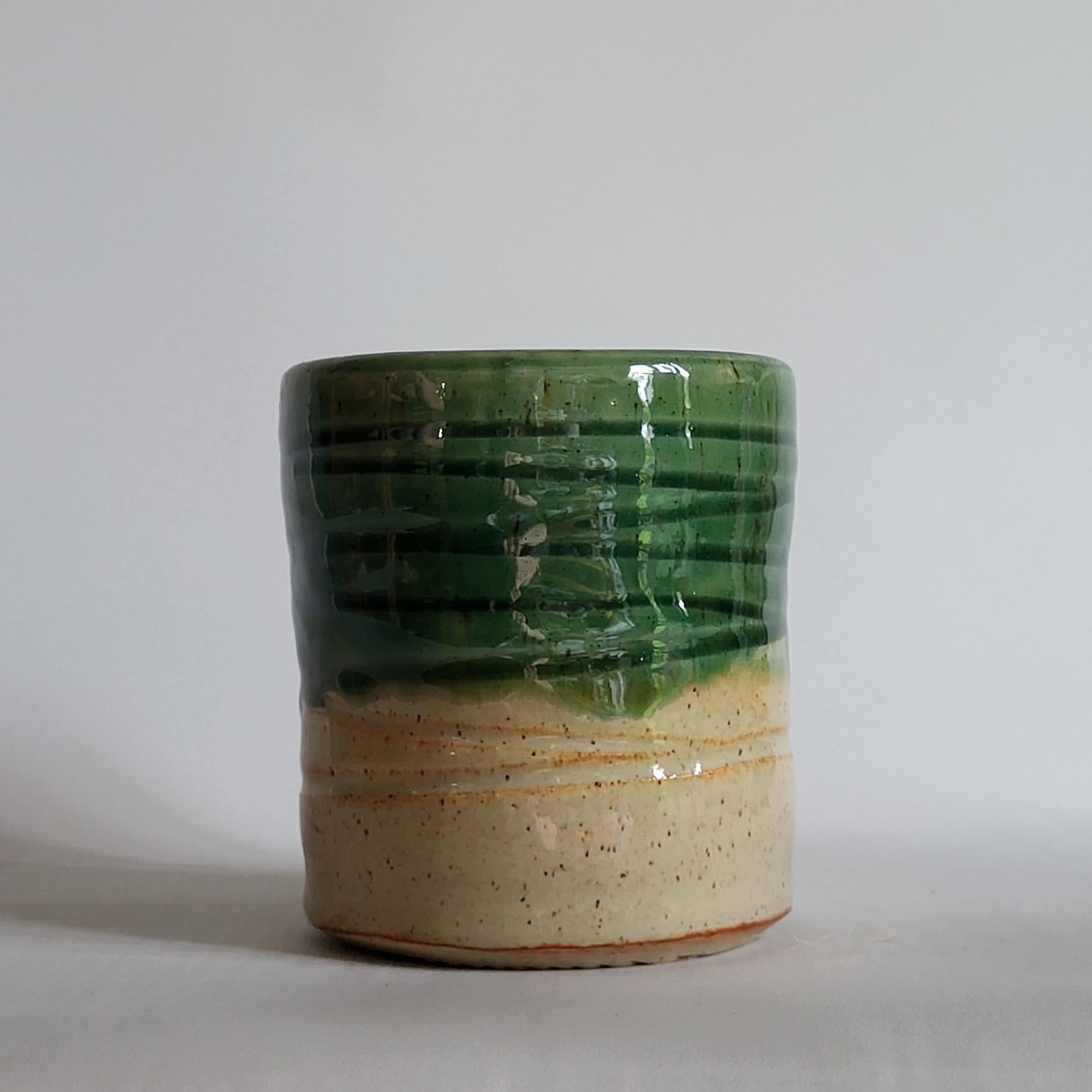 Tea Cup medium size with Wabi Sabi carved design and drippy glazes