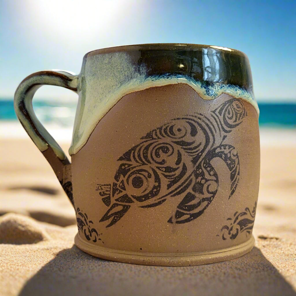 Ceramic mug with turtle design on a gradient background