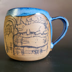 Cozy cat and books at home mug