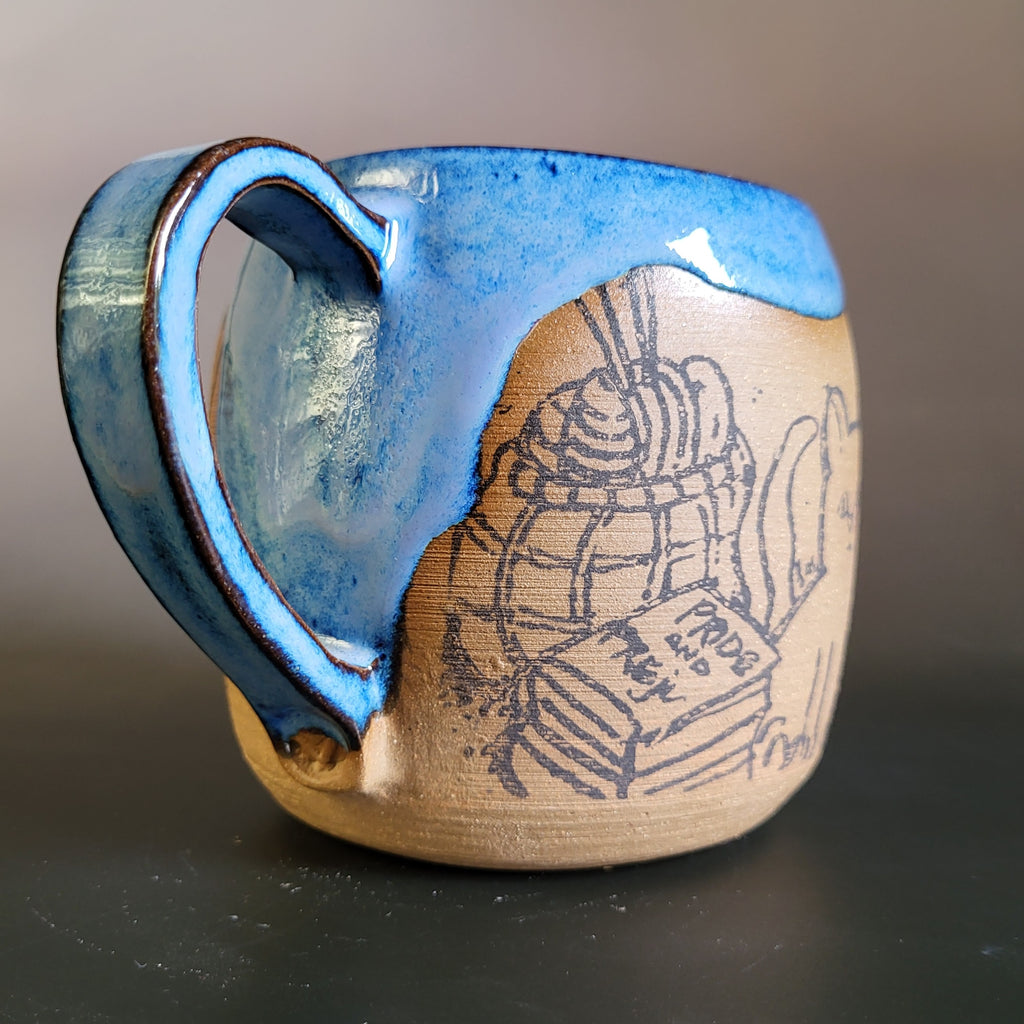 Cozy cat and books at home mug