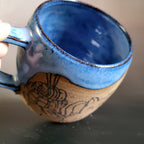 Cozy cat and books at home mug