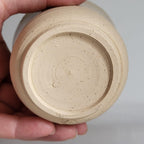 Tea Cup small size with simple carved design and beige off white glaze
