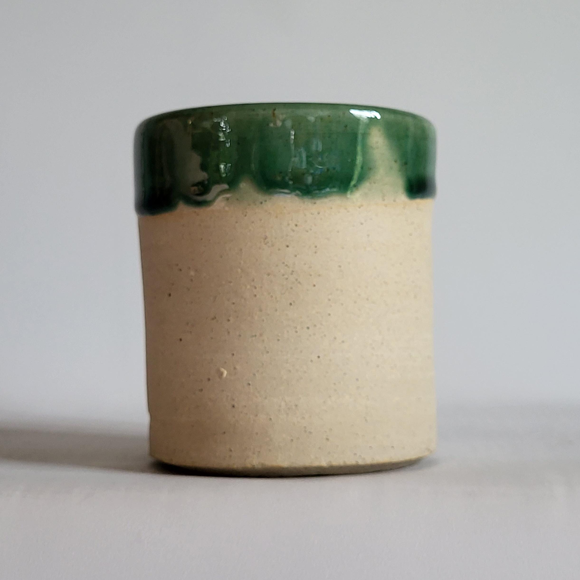 Tea Cup, Buddha face tea cup, serene happy face carved design. green glaze hat