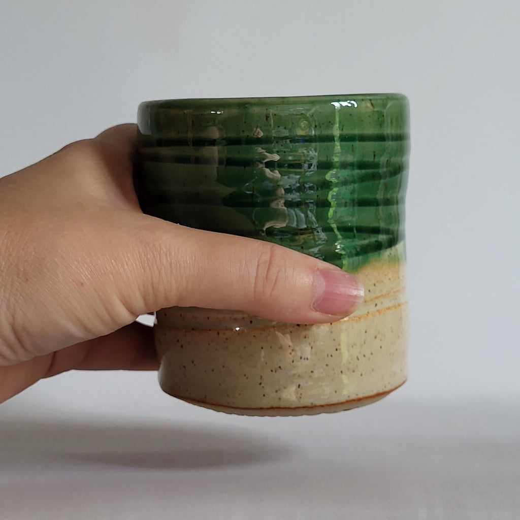 Tea Cup medium size with Wabi Sabi carved design and drippy glazes